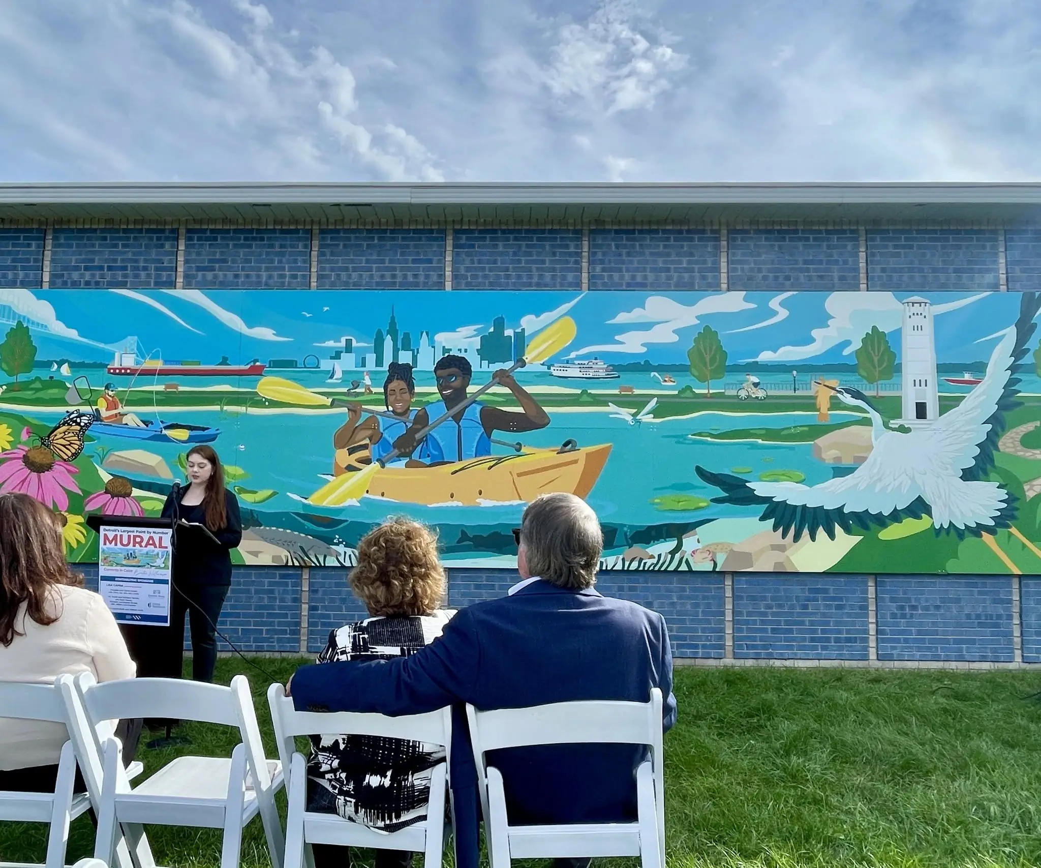 Detroiters spent the summer painting a 32-foot mural at the Dossin Great Lakes Museum
